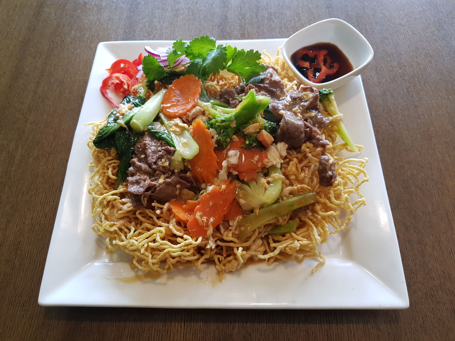 Beef and Crispy fried egg noodles